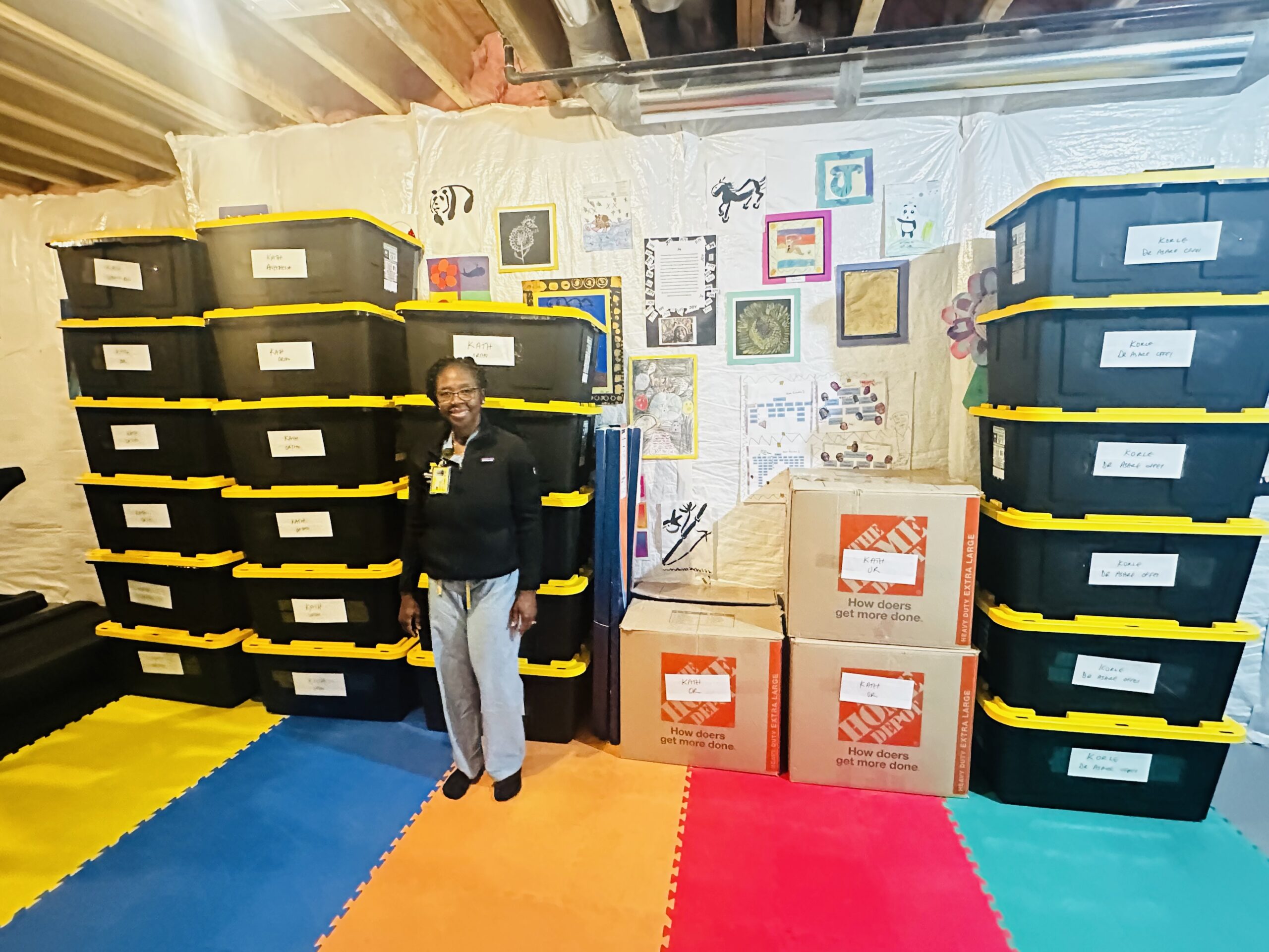 Organizer with medical supply bins labeled for KATH and Korle Bu hospitals in Ghana