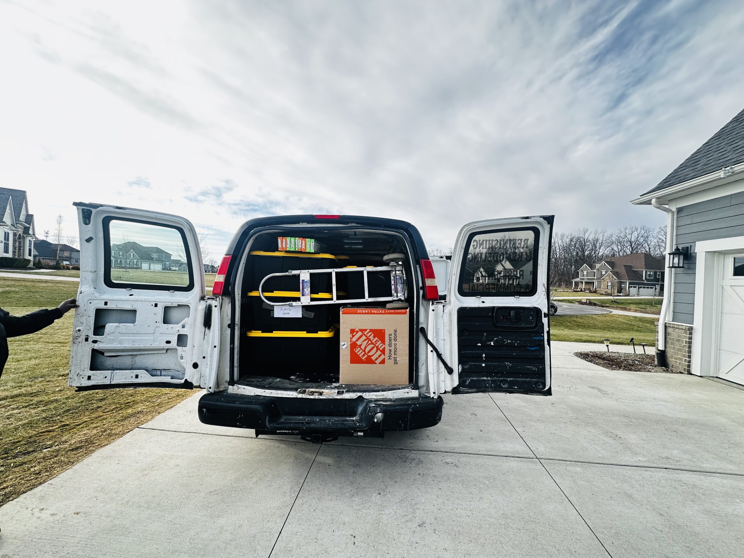 Cargo van with medical supply bins ready for transport